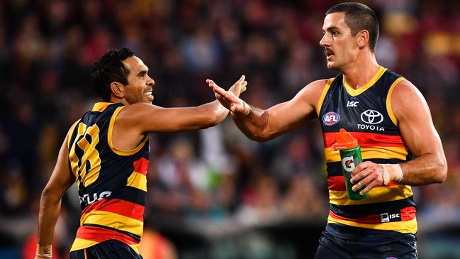 Eddie Betts and Taylor walker celebrate a goal. Picture: Getty Images