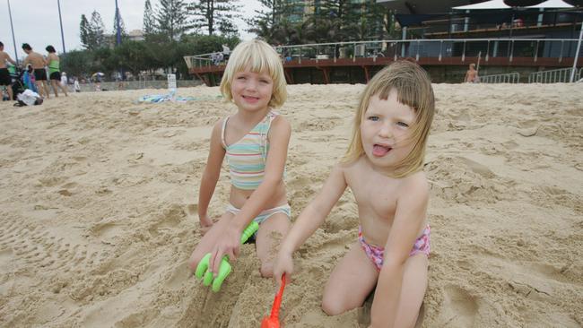 At Mooloolaba Beach celebrating Christmas Day in 2004 with family were Jessica, 5, and sister Rachael, 3, Brown.