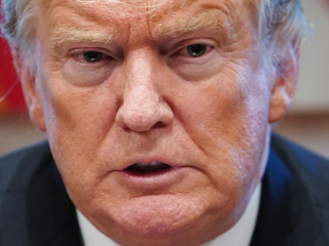 TOPSHOT - US President Donald Trump speaks during a roundtable meeting with conservative leaders at the White House on January 23, 2019, to discuss the security and humanitarian crisis at the southern border. (Photo by MANDEL NGAN / AFP)