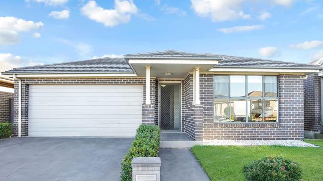 Biance Rossetto added a personal touch during the sale of 15 Sinclair Parade, Jordan Springs. Picture: realestate.com.au