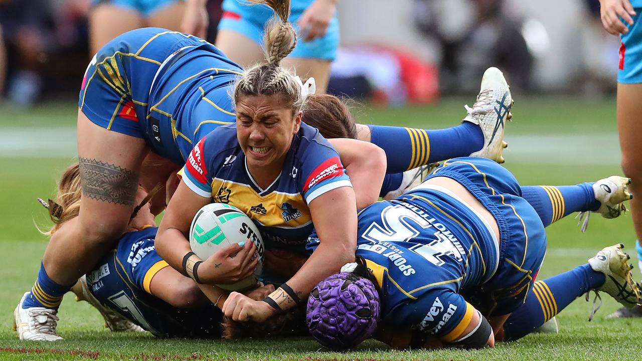 Shannon Mato of the Titans is tackled during the round four NRLW match between Gold Coast Titans and Parramatta Eels at AAMI Park, on September 10, 2022, in Melbourne, Australia. (Photo by Kelly Defina/Getty Images)