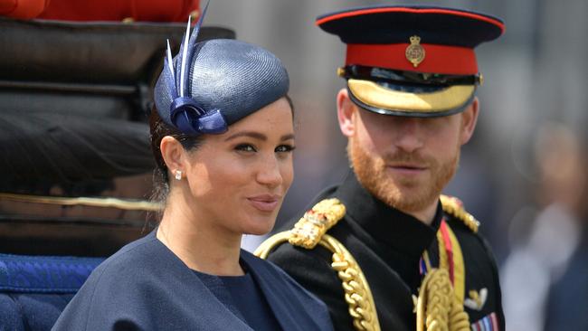 Britain's Meghan, Duchess of Sussex (L) and Britain's Prince Harry, Duke of Sussex (R) return to Buckingham Palace after the Queen's Birthday Parade, 'Trooping the Colour', in 2019. Picture: Getty