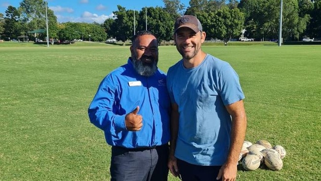 Cameron Smith with the Mudgeeraba Redbacks Junior Vice President.