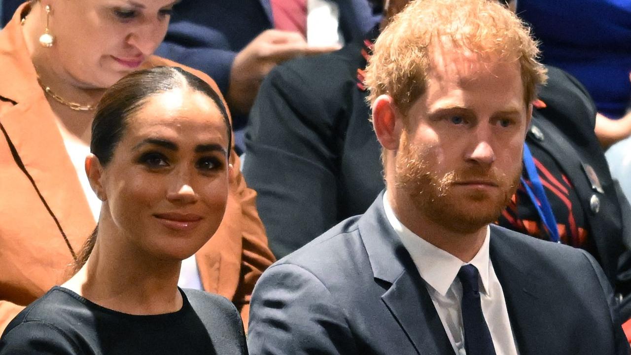 The book claims Meghan gave Harry an ultimatum. Picture: AFP.