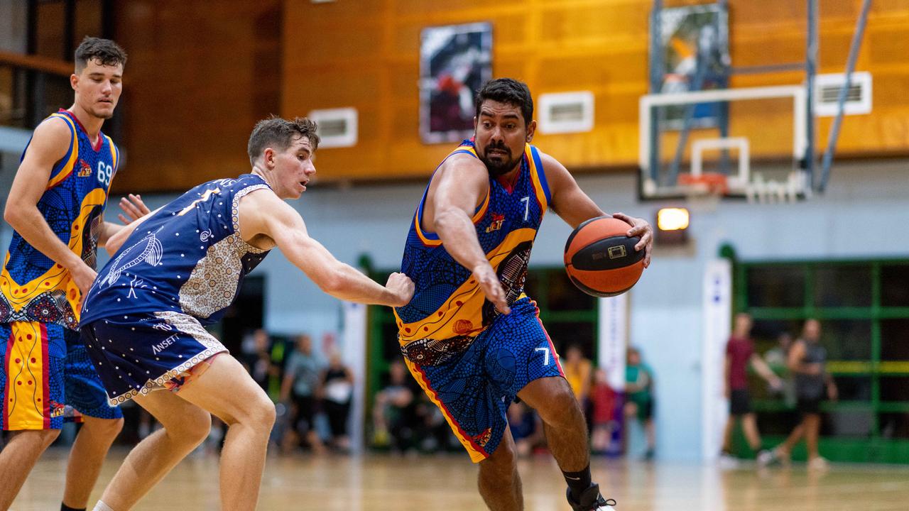 Alex Weetra dribbles under pressure in Darwin Basketball Men's Championship Round 20: Ansett v Tracy Village Jets. Picture: Che Chorley