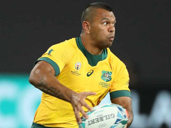 SAPPORO, JAPAN - SEPTEMBER 21:  Kurtley Beale of Australia offloads the ball during the Rugby World Cup 2019 Group D game between Australia and Fiji at Sapporo Dome on September 21, 2019 in Sapporo, Hokkaido, Japan. (Photo by David Rogers/Getty Images)