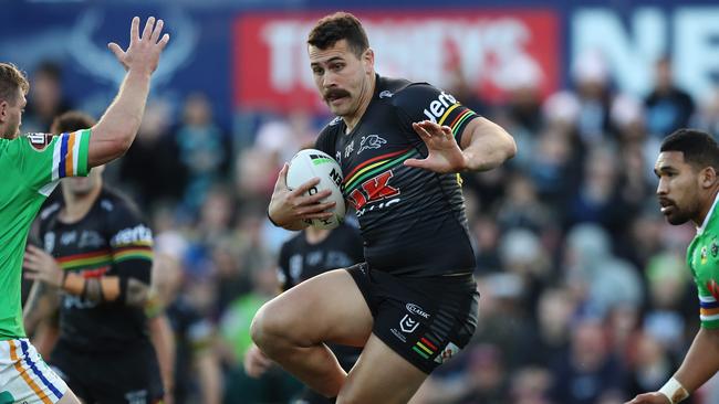 Penrith's Reagan Campbell-Gillard tries to evade defenders during the Penrith v Canberra NRL match at Panthers Stadium, Penrith. Picture: Brett Costello