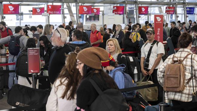 The school holidays got off to a bumpy start at Sydney Domestic Airport “strong winds” forced the cancellation of nearly 50 flights and delayed many others in and out of Sydney. Picture: NCA NewsWire/Monique Harmer