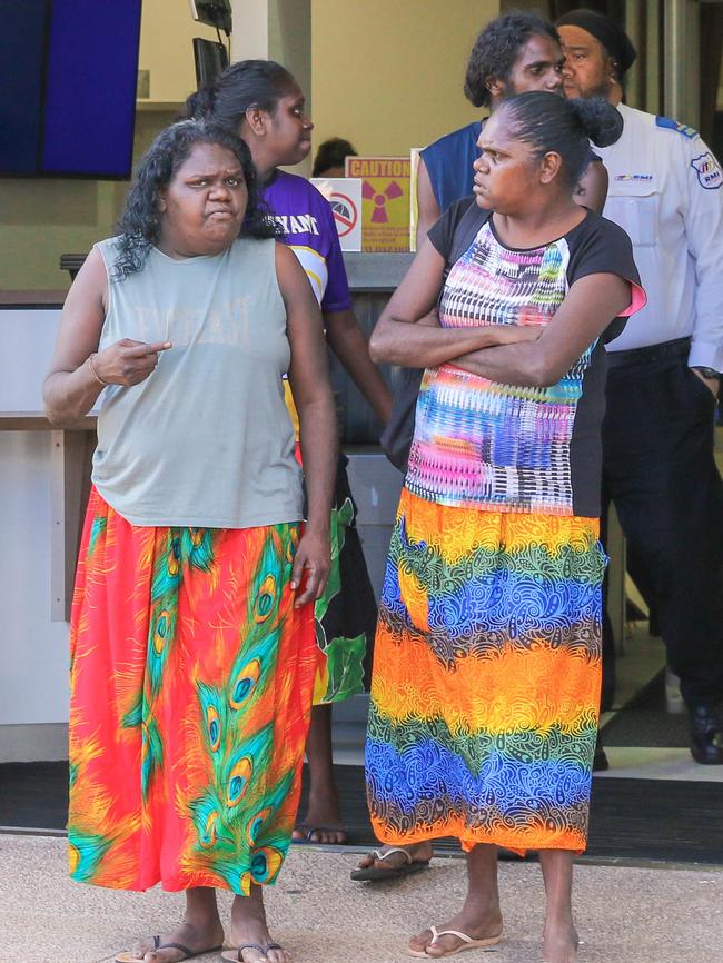 Relatives of Gerard Bunumbirr Marika leave the Darwin Local Court after he was refused bail to attend to sorry business following the alleged murder of his son in Yirrkala last week. Picture: Glenn Campbell