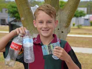 BOTTLED UP: 12-year-old Dominic Law has made nearly $600 in only a few months collecting recyclable bottles. Picture: Matt Collins