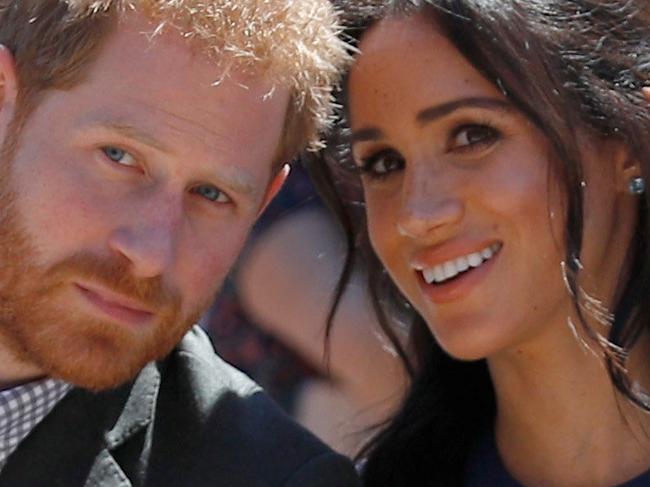 SYDNEY, AUSTRALIA - OCTOBER 19: Prince Harry, Duke of Sussex and Meghan, Duchess of Sussex watch a performance during their visit to Macarthur Girls High School on October 19, 2018 in Sydney, Australia. The Duke and Duchess of Sussex are on their official 16-day Autumn tour visiting cities in Australia, Fiji, Tonga and New Zealand. (Photo by Phil Noble - Pool/Getty Images)
