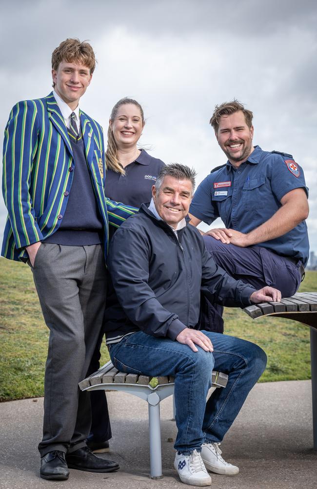 Kip Merton, 16, and his dad Mark are reunited with paramedic Josh Trpenovski and triple-zero call taker Lauren Johnson. Picture: Jake Nowakowski