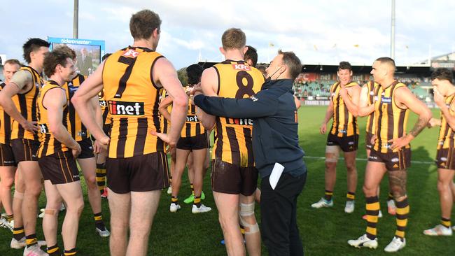 Clarkson hugs Sam Frost after the Launceston game. Picture: AFL Photos/via Getty Images