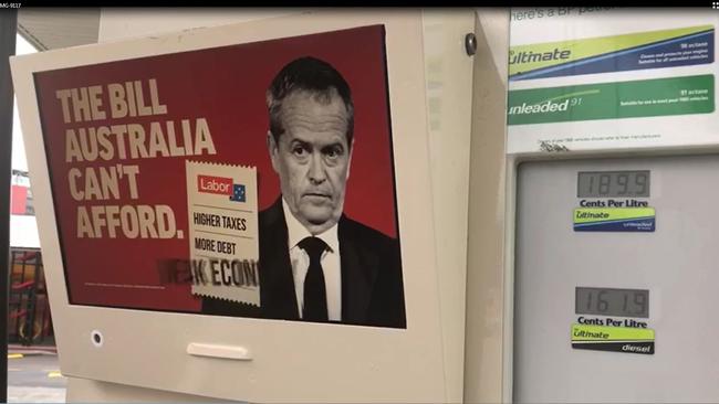 The Coalition is hoping to catch the eyes of voters at petrol bowsers in the final days of the election campaign.