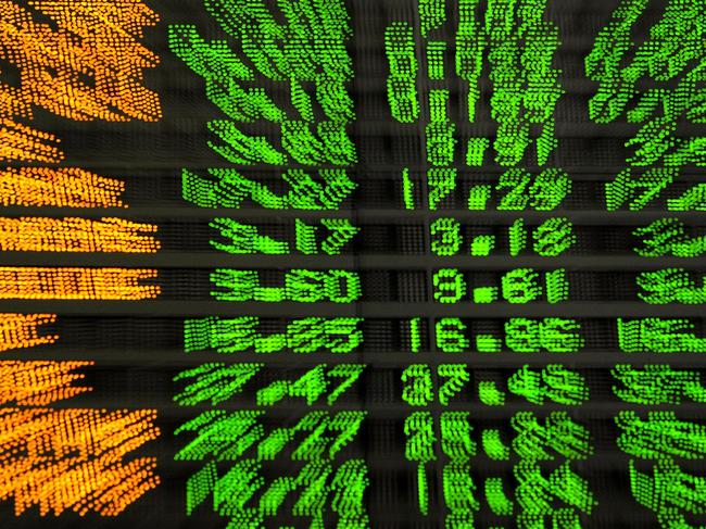 WIRE: This Australian Stock Exchange All Ordinaries board graphic shows company share prices in positive territory indicated by the green numbering, at the opening of trading in Sydney, 11/03/2009.