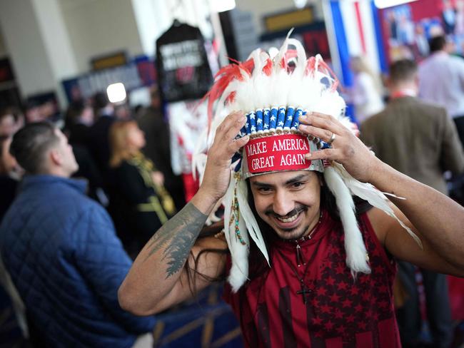 An attendee at the four-day gathering of conservative US politicians, international leaders, media personalities and businessmen. Picture: Andrew Harnik / Getty via AFP