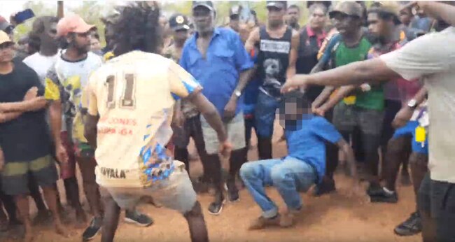 Men were filmed fighting on the streets of Doomadgee. Picture: supplied.
