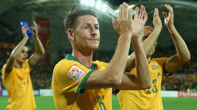 MELBOURNE, AUSTRALIA - JANUARY 09: Nathan Burns of Australia celebrates after Australia defeated Kuwait during the 2015 Asian Cup match between the Australian Socceroos and Kuwait at AAMI Park on January 9, 2015 in Melbourne, Australia. (Photo by Robert Cianflone/Getty Images)