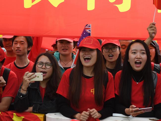 Supporters welcome Chinese Premier Li Keqiang to Parliament House in Canberra. Picture: AAP Image/Sam Mooy