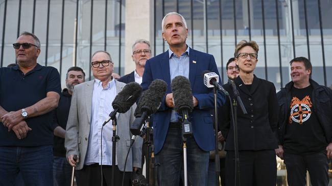 Qantas workers, TWU National Secretary Michael Kaine, ACTU Secretary Sally McManus, Senator Tony Sheldon during a press conference at the High Court in Canberra. Picture: NCA NewsWire / Martin Ollman