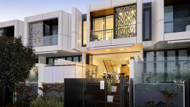 Near-new villa offers luxury riverfront living in the exclusive ...