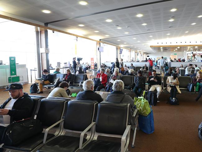 Travellers have been stuck in the airport departure lounge for several hours. Picture: SAM ROSEWARNE.