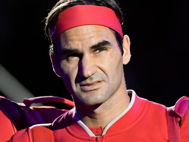 (FILES) In this file photo taken on October 21, 2019 shows Swiss Roger Federer in Basel. - Men's Grand Slam singles record-holder Roger Federer said on June 10, 2020 he would be sidelined until 2021 after undergoing keyhole surgery on his right knee. (Photo by FABRICE COFFRINI / AFP)