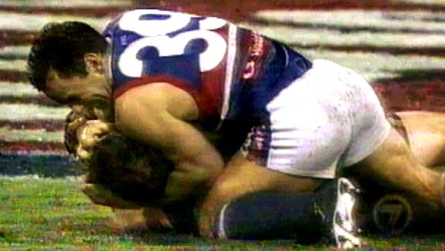 Footage show Tony Liberatore clawing at Craig McRae’s face.