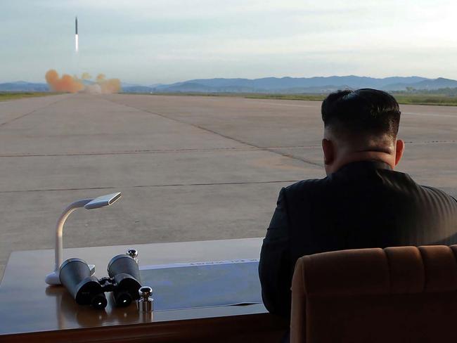 North Korean leader Kim Jong-un inspecting a launching drill of the medium-and-long range strategic ballistic rocket Hwasong-12 on September 16. Picture: AFP / KCNA via KNS