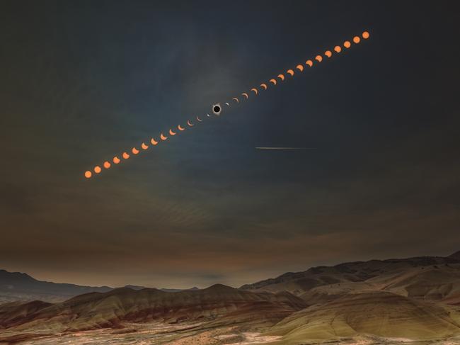 Image Name: Solar Eclipse Sequence Photographer Name: Wenjie Qiao Year: 2018 Image Description: It was a lifetime experience to witness a solar eclipse. We got such a chance on August 21, 2017. I went to Painted Hills in Oregon in order to capture the Solar Eclipse. The whole sequence happened just above the main scenic view of the Painted Hills. The whole sequence lasted for several hours but the full eclipse only lasted for two minutes. Everyone around me is shouting and jumping. It was like a whole different world, unforgettable. This picture was processed to reproduce what I saw on that day at that moment. Copyright: Wenjie Qiao, United States, Shortlist, Open Enhanced and 2nd, United States National Award. Picture: Sony World Photography Awards/ Wenjie Qiao