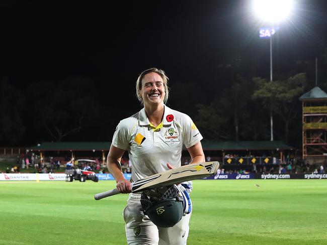 Ellyse Perry leaves the field after finishing 213 not out against England. Picture. Phil Hillyard