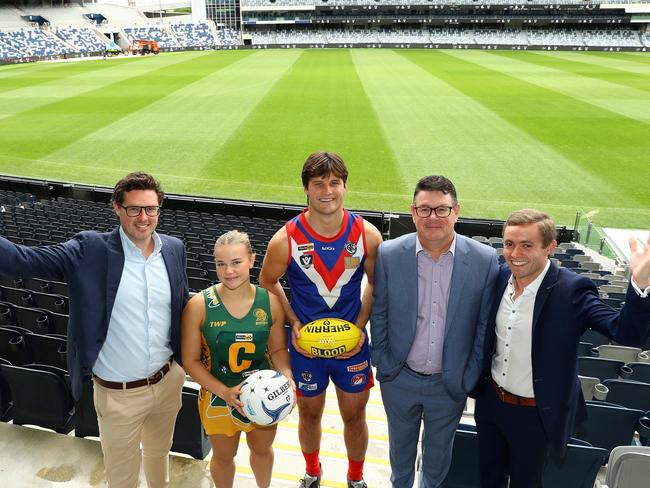 Geelong Cats chief strategy and growth officer Marcus King, Leopold A grade netballer Millie Holand, South Barwon footballer Matt Caldow, Kardinia Park Stadium Trust CEO Gerard Griffin and AFL Barwon regional general manager Edward Wilson after the grand final announcement. Picture: Alison Wynd