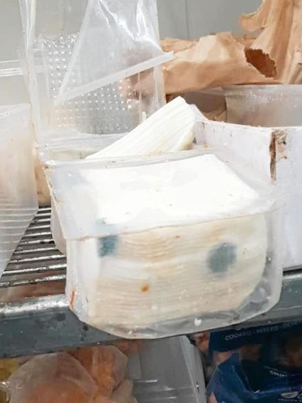 Cheese inside a fridge in the Domino’s store.