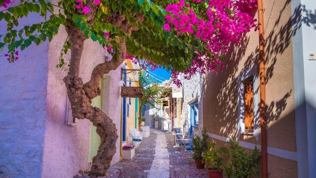 5/11
Syros
Named by Conde Nast Traveller as the best Greek island to visit in 2021, Syros is lauded for its colourful capital, Ermoupoli, vibrant cultural scene, and fabulous seaside tavernas.