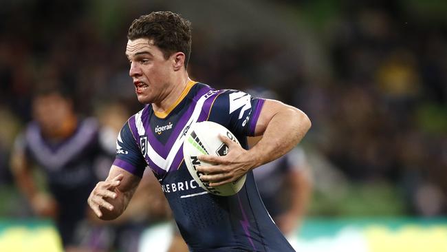 Brodie Croft of the Storm is tackled during the round 25 NRL match between the Melbourne Storm and the North Queensland Cowboys at AAMI Park on September 06, 2019 in Melbourne, Australia. (Photo by Daniel Pockett/Getty Images)