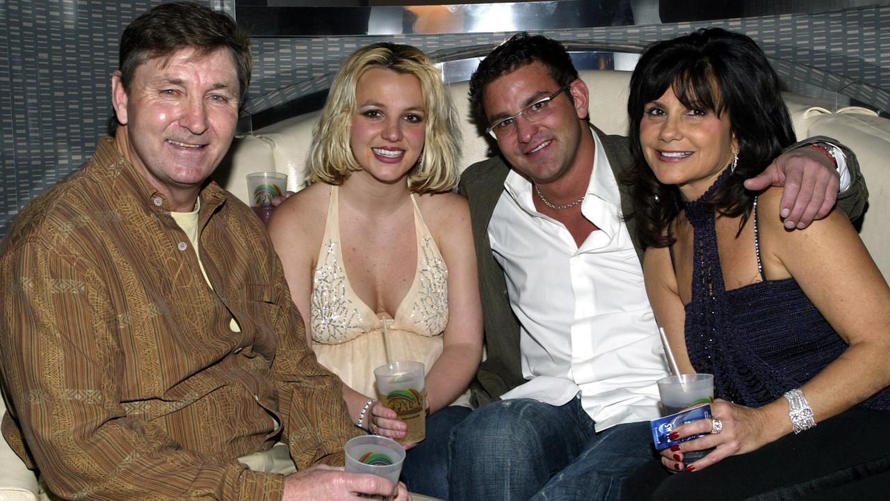 Britney Spears with (L-R) her father Jamie, brother Bryan and mother Lynne. Picture: Getty