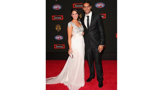 Understated: Daniel Wells of the Kangaroos with wife Mariangela. Photo: Getty Images