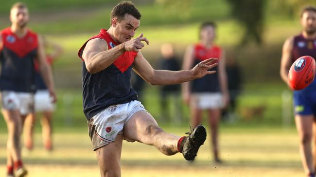 Jai Norman for Diamond Creek kicks at goal. Picture: Stuart Milligan