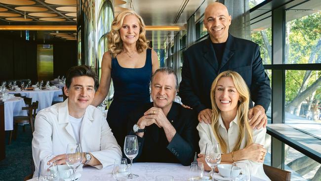 Neil Perry (centre) with wife Samantha (rear) and (from left) industrial designer David Caon and architectural and interior design team Vince Alafaci and Caroline Choker of ACME. Picture: Hugh Stewart