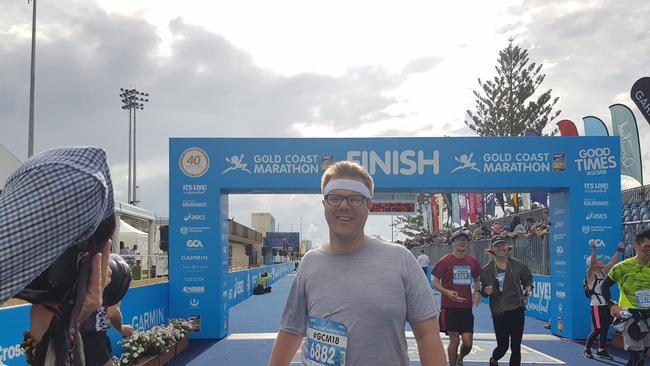 Gold Coast Bulletin journalist Alister Thomson successfully finishes the Gold Coast Marathon. Photo: Tanya Westthorp