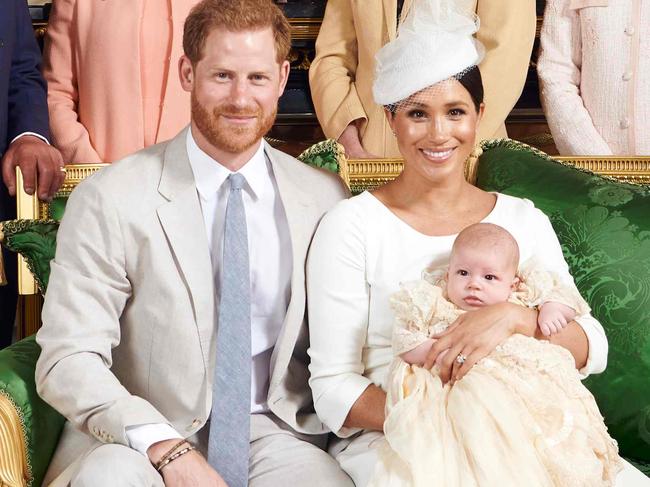 This official handout Christening photograph released by the Duke and Duchess of Sussex shows Britain's Prince Harry, Duke of Sussex (centre left), and his wife Meghan, Duchess of Sussex holding their baby son, Archie Harrison Mountbatten-Windsor flanked by (L-R) Britain's Camilla, Duchess of Cornwall, Britain's Prince Charles, Prince of Wales, Ms Doria Ragland, Lady Jane Fellowes, Lady Sarah McCorquodale, Britain's Prince William, Duke of Cambridge, and Britain's Catherine, Duchess of Cambridge in the Green Drawing Room at Windsor Castle, west of London on July 6, 2019. - Prince Harry and his wife Meghan had their baby son Archie christened on Saturday at a private ceremony. (Photo by Chris ALLERTON / SUSSEXROYAL / AFP) / XGTY / RESTRICTED TO EDITORIAL USE - MANDATORY CREDIT "AFP PHOTO / SUSSEXROYAL / CHRIS ALLERTON" - NO MARKETING NO ADVERTISING CAMPAIGNS - NO COMMERCIAL USE - NO THIRD PARTY SALES - RESTRICTED TO SUBSCRIPTION USE - NO CROPPING OR MODIFICATION - NOT FOR USE AFTER DECEMBER 31, 2019 - DISTRIBUTED AS A SERVICE TO CLIENTS /