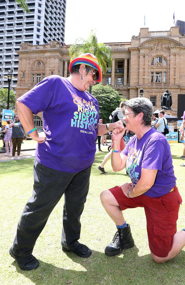 Roz Rogers and partner Judy Munns celebrate the decision. Same-sex couples and their friends and family gather at Queens Gardens this morning to watch the SSM result announced live by the ABS. Picture: Peter Wallis