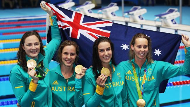 Australia's Cate Campbell, Bronte Campbell, Brittany Elmslie, Emma McKeon celebrate after winning gold. Picture: Phil Hillyard