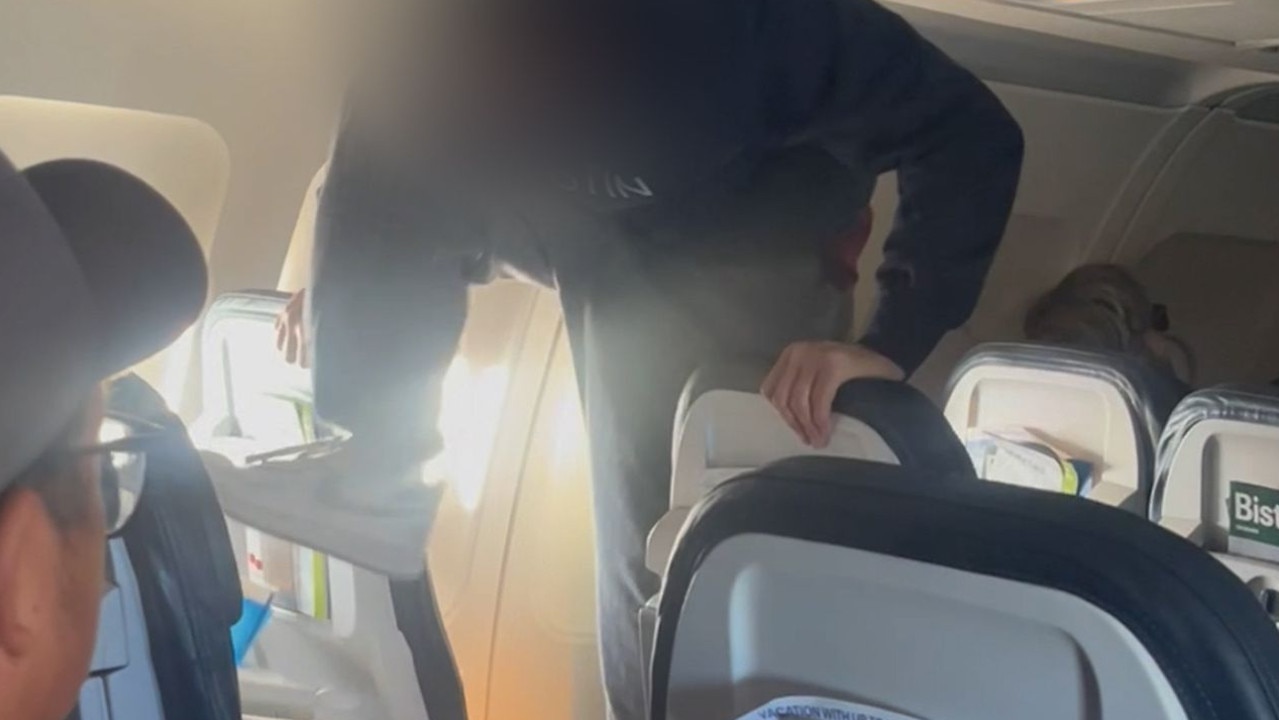 A man was filmed repeatedly kicking a plane seat. Picture: SWNS