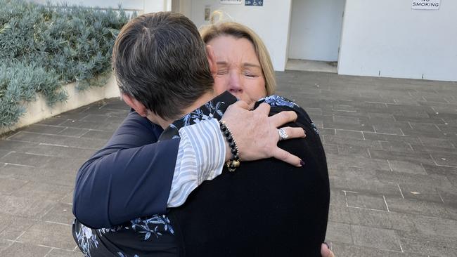 Libby Ruge’s mothers Jules Harrison and Julie Ruge embrace outside Wollongong Courthouse after the guilty verdict. Picture: Dylan Arvela