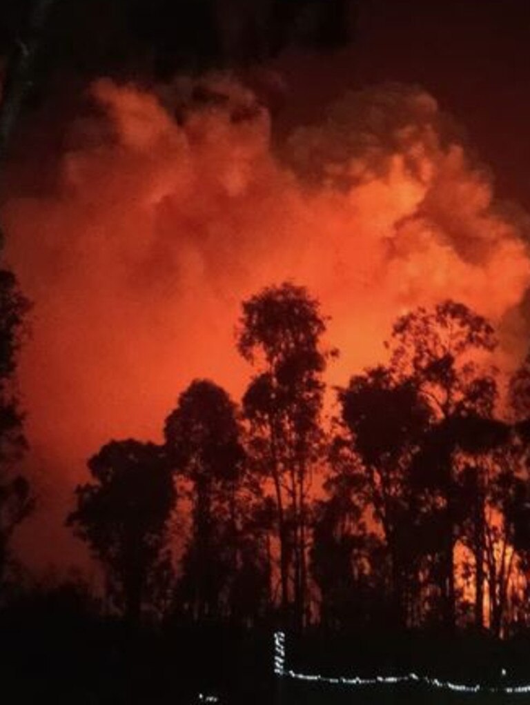 Fire towering over Kerry Dare's property.