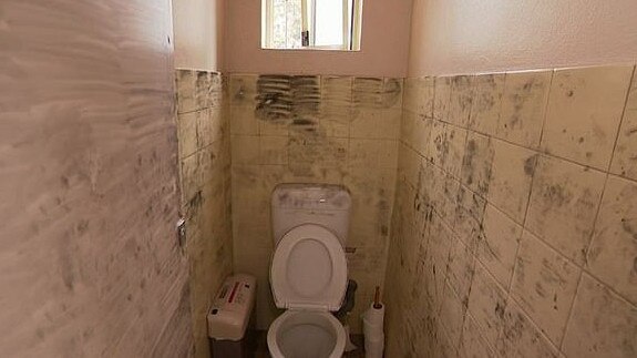 The bathroom where a young girl was rescued from being sexually assaulted.