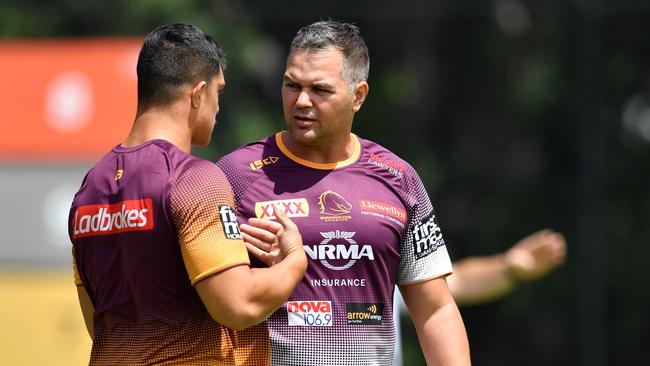 Broncos coach Anthony Seibold (right) is seen during Brisbane Broncos training at Clive Berghofer Field in Brisbane, Friday, February 22, 2019. The Broncos are playing the Wynnum-Manly Seagulls in a pre-season trial match on Saturday at Kougari Oval in Brisbane. (AAP Image/Darren England) NO ARCHIVING