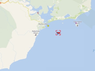 HMAS Choules and MV Sycamore off the coast of Mallacoota at 8am Thursday.