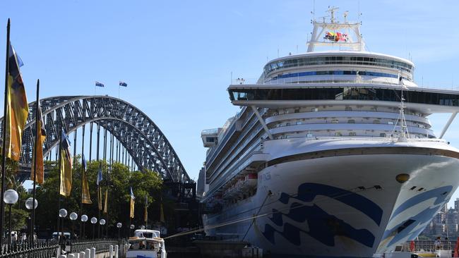 Cruise ship passengers disembark from the Ruby Princess at Sydney’s Circular Quay on March 19, 2020. Photo: Dean Lewins.